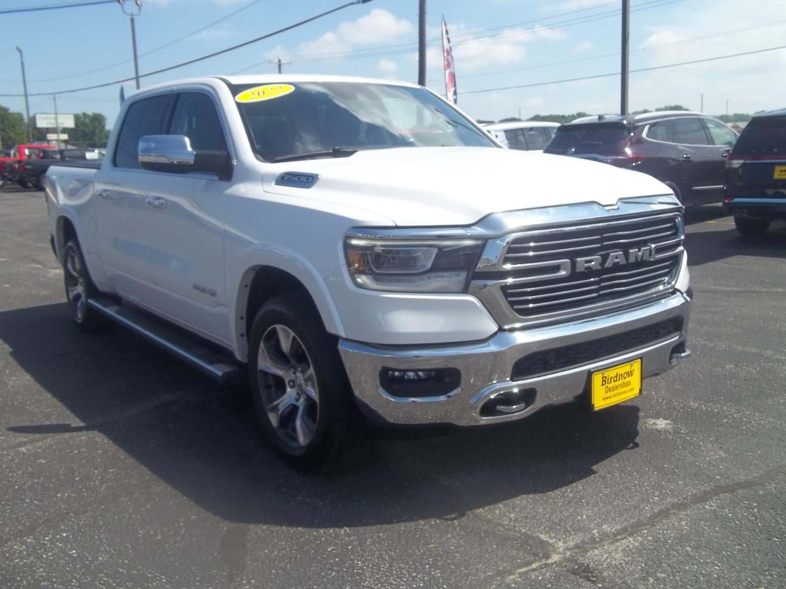2022 RAM 1500 Laramie in Ivory White Tri-Coat Pearlcoat — front three-quarter view