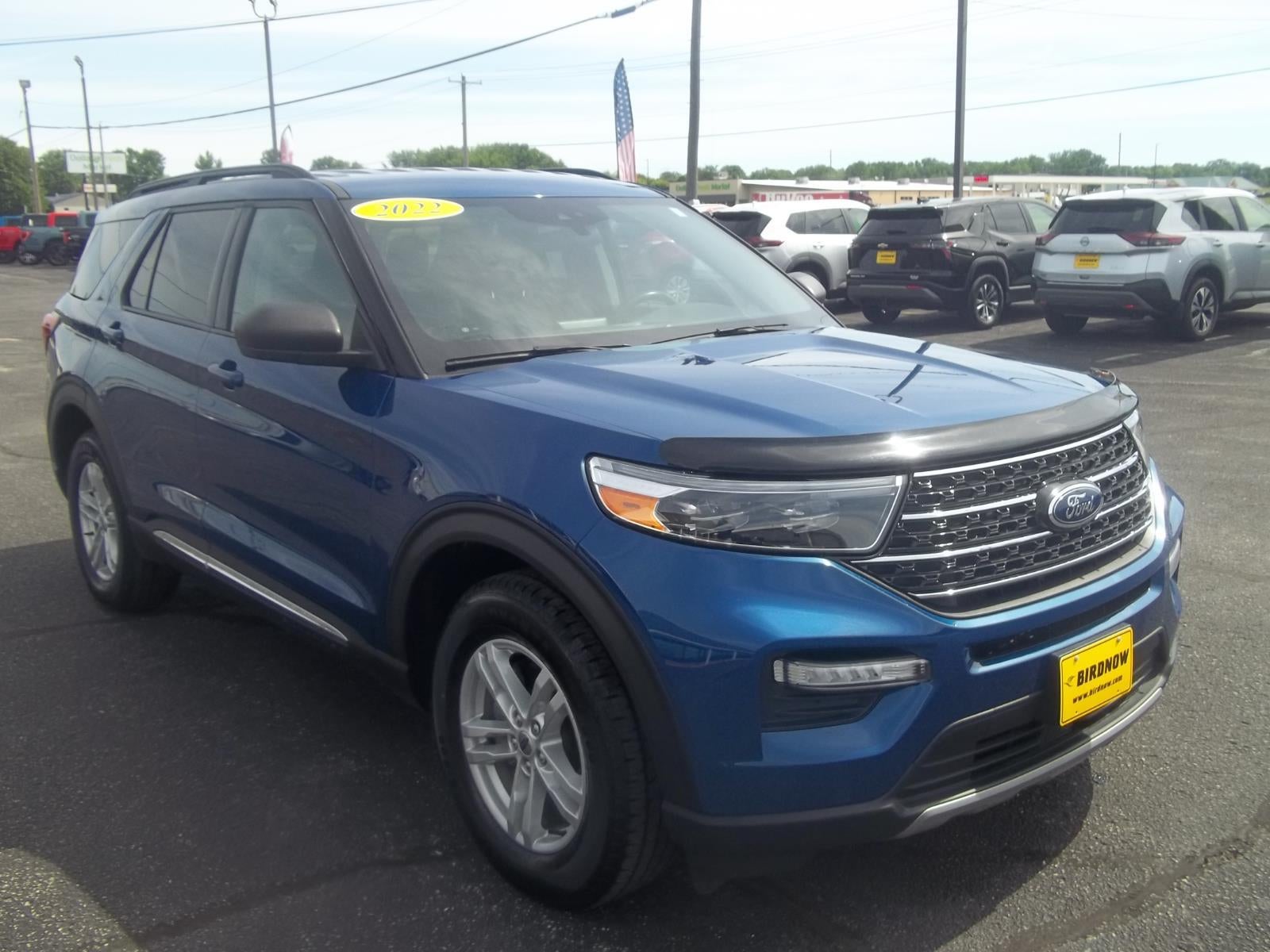 2022 Ford Explorer XLT in Atlas Blue Metallic — front three-quarter view