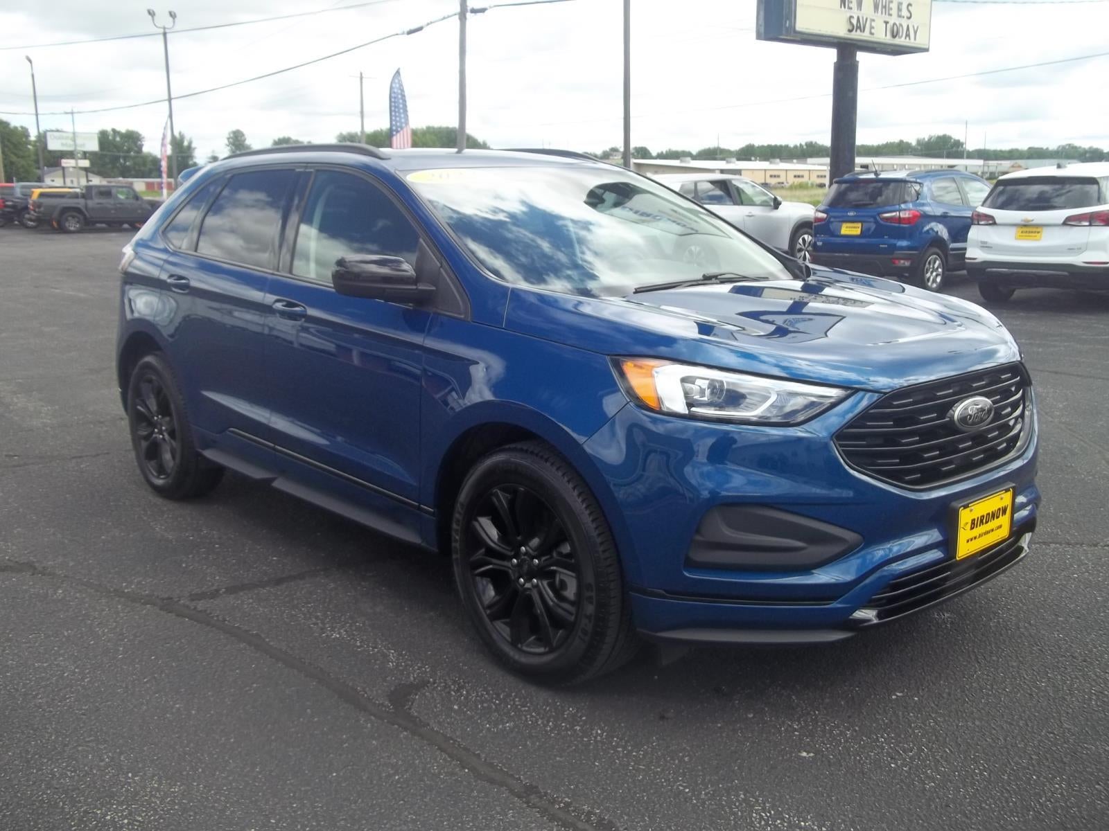 2022 Ford Edge SE in Atlas Blue Metallic — front three-quarter view